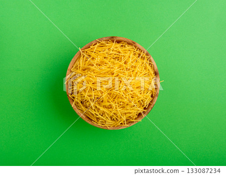Raw vermicelli, gold soup pasta, small homemade noodles, thin Italy macaroni Raw vermicelli, gold soup pasta, small homemade noodles, thin Italy macaroni 133087234