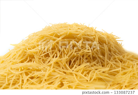 Raw vermicelli textured background, gold soup pasta pattern, small homemade noodles mock up 133087237