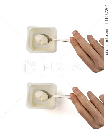 Yogurt cup isolated, yoghurt with orange fruits pieces in plastic pot, spoon in milk pudding Yogurt cup isolated, yoghurt with orange fruits pieces in plastic pot, spoon in milk pudding 133087264