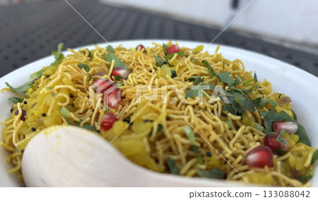 Poha Indian breakfast food. Healthy pohe rice flakes dish 133088042