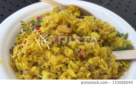 Poha Indian breakfast food. Healthy pohe rice flakes dish 133088044