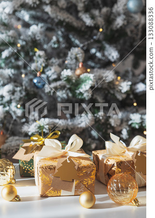 Christmas Gifts in Festive Interior under Sun Light Christmas Gifts in Festive Interior under Sun Light 133088336