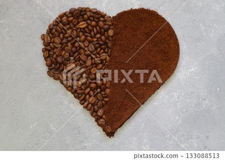 Heart coffee. Roasted coffee beans in the shape of heart on bright stone background. Concept of coffee love, Heart coffee. Roasted coffee beans in the shape of heart on bright stone background. Concept of coffee love, 133088513