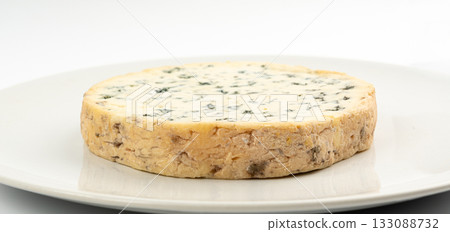 Fourme cheese, stinky french cheese, Fourme d'Ambert gourmet food, semi-hard blue cheese 133088732