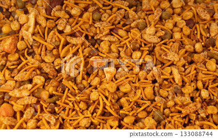 Navrattan namkeen mixture. Indian nimko snack, spicy and sweet farsaan 133088744