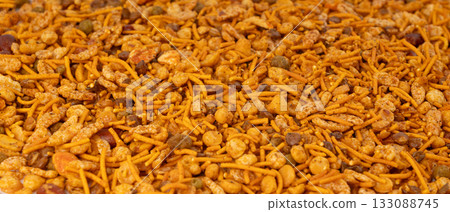 Navrattan namkeen mixture. Indian nimko snack, spicy and sweet farsaan 133088745