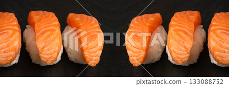 Slices of Raw Salmon Fillet on Black Background Mockup Top View 133088752