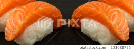 Slices of Raw Salmon Fillet on Black Background Mockup Top View 133088755