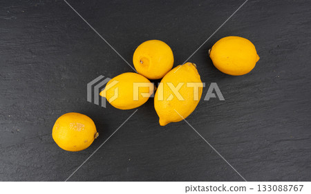 Old dried lemons. Fruits with darkened skins Old dried lemons. Fruits with darkened skins 133088767
