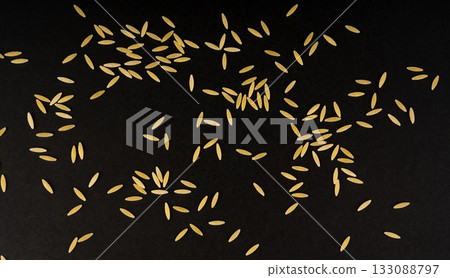 Raw orzo pasta, risoni or kritharaki pile 133088797
