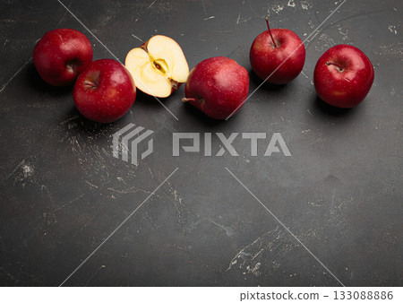 Red apples autumn harvest fruit dark background fresh healthy organic produce harvest copy space 133088886