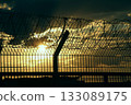 Airport guardrail at the days night stock image Airport guardrail at the days night stock image 133089175