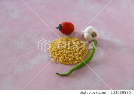 Italian pasta panorama, a flat lay of various sorts of pasta, top shot on a black background Italian pasta panorama, a flat lay of various sorts of pasta, top shot on a black background 133089580