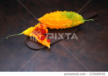 Momordica charantia isolated on a rusty background. Ripe whole fruits of Momordica charantia, 133089592