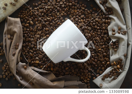 Cup of coffee and coffee beans. Top view, flat lay. Cup of coffee and coffee beans. Top view, flat lay. 133089598