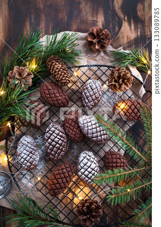 Christmas homemade chocolate pine cone shortbread cookies, powdered sugar dressing Christmas homemade chocolate pine cone shortbread cookies, powdered sugar dressing 133089785