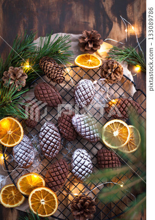 Christmas homemade chocolate pine cone shortbread cookies, powdered sugar dressing Christmas homemade chocolate pine cone shortbread cookies, powdered sugar dressing 133089786