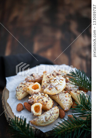 Homemade delicious almond and cottage cheese with apricot jam filling crescent cookies Homemade delicious almond and cottage cheese with apricot jam filling crescent cookies 133089787
