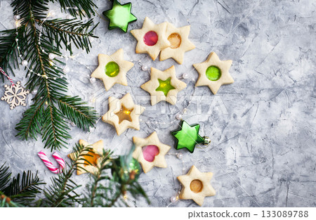 Handmade stained glass cookies (window biscuits) for Christmas holiday, top view Handmade stained glass cookies (window biscuits) for Christmas holiday, top view 133089788