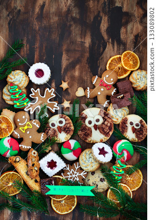 Sweet Christmas cookies on rustic table, top view 133089802