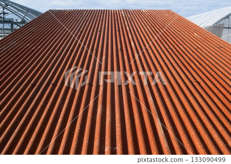 Rusty corrugated tin roof Rusty corrugated tin roof 133090499