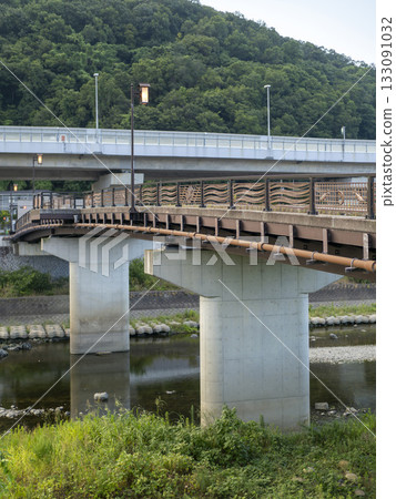 Kinu-no-be Bridge spanning the Inagawa River 133091032