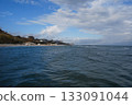 Beautiful seascape of the Black Sea. A seascape of the Black Sea with gentle waves lapping a sandy beach. 133091044
