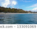 Beautiful seascape of the Black Sea. A seascape of the Black Sea with gentle waves lapping a sandy beach. 133091069