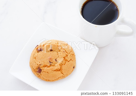 Chocolate Chip Cookies and Coffee - Enjoy a coffee break with chocolate chip cookies and freshly brewed coffee Chocolate Chip Cookies and Coffee - Enjoy a coffee break with chocolate chip cookies and freshly brewed coffee 133091145