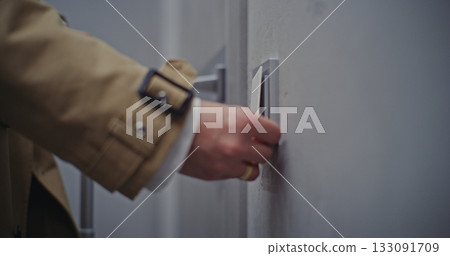 Female Hands Tapping Plastic Key Card on Electronic Door Lock Hotel Room Entrance Female Hands Tapping Plastic Key Card on Electronic Door Lock Hotel Room Entrance 133091709