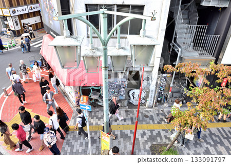 A view of Musashino-dori Street from the south exit of Shinjuku Station 133091797