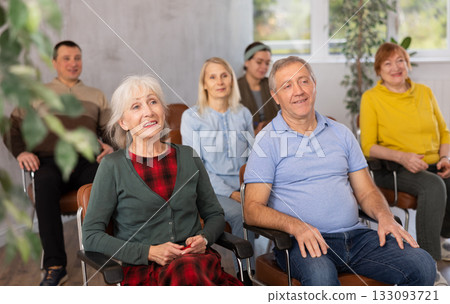 Interested elderly people listening language courses for older adults 133093721