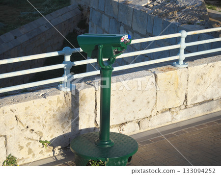 Strait of Gibraltar, binoculars near the Europa Point Lighthouse, sunrise, early April morning Strait of Gibraltar, binoculars near the Europa Point Lighthouse, sunrise, early April morning 133094252