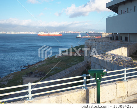 Strait of Gibraltar, binoculars near the Europa Point Lighthouse, sunrise, early April morning 133094253