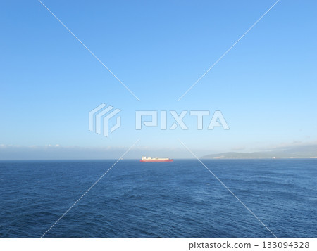 Strait of Gibraltar, view from Cape Europa Lighthouse, Algeciras on the opposite shore, early April morning 133094328