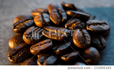 An evocative close-up of roasted coffee beans showcasing rich textures inviting aroma and morning An evocative close-up of roasted coffee beans showcasing rich textures inviting aroma and morning 133095283