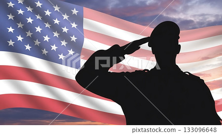 Silhouette of a soldier saluting the american flag at sunset 133096648