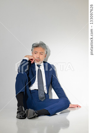 Sitting businessman Sitting businessman 133097626
