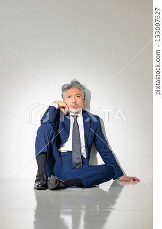 Sitting businessman Sitting businessman 133097627
