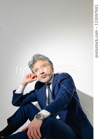 Sitting businessman Sitting businessman 133097681