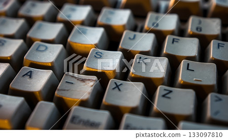 Macro photograph depicting the textured surface and aging aesthetics of a vintage computer 133097810