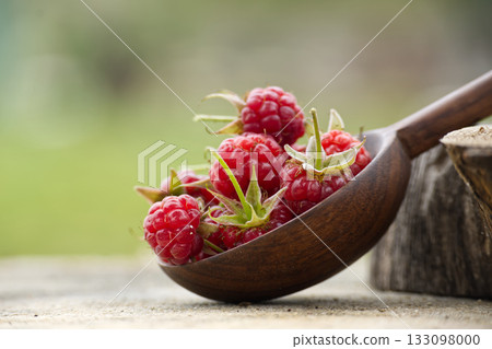 Fresh Raspberries In Wooden Scoop On Rustic Table Showcasing Natural Freshness And Summer Flavor Fresh Raspberries In Wooden Scoop On Rustic Table Showcasing Natural Freshness And Summer Flavor 133098000