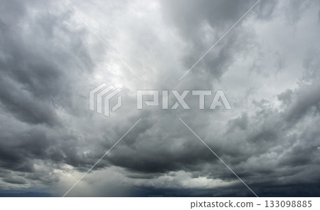 Storm clouds with the rain. Nature Environment Dark huge cloud sky black stormy cloud 133098885