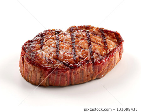 Juicy grilled filet mignon steak wrapped in crispy bacon. Gourmet beef tenderloin with barbecue char marks isolated on a clean white background. Juicy grilled filet mignon steak wrapped in crispy bacon. Gourmet beef tenderloin with barbecue char marks isolated on a clean white background. 133099433