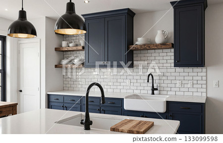 Modern Farmhouse Kitchen. A kitchen that updates the farmhouse style with clean lines and modern functionality. It features dark navy Modern Farmhouse Kitchen. A kitchen that updates the farmhouse style with clean lines and modern functionality. It features dark navy 133099598