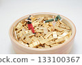 Miniature People Climbing Gold Bars in a Bowl of Wealth 133100367