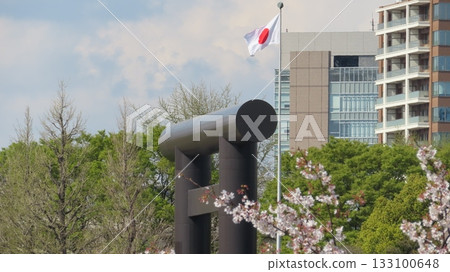 Yasukuni Shrine's large torii gate and the Japanese flag 133100648