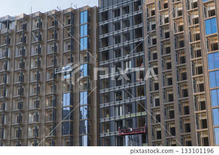 Modern high-rise building under construction 133101196