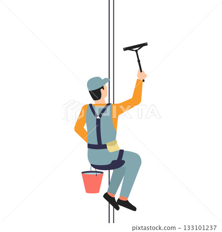 Male window cleaner in uniform hangs from a safety rope with a scraper in his hand Male window cleaner in uniform hangs from a safety rope with a scraper in his hand 133101237