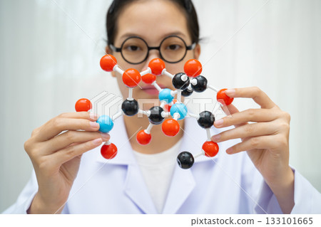 Molecules chemical on a periodic table background. 133101665